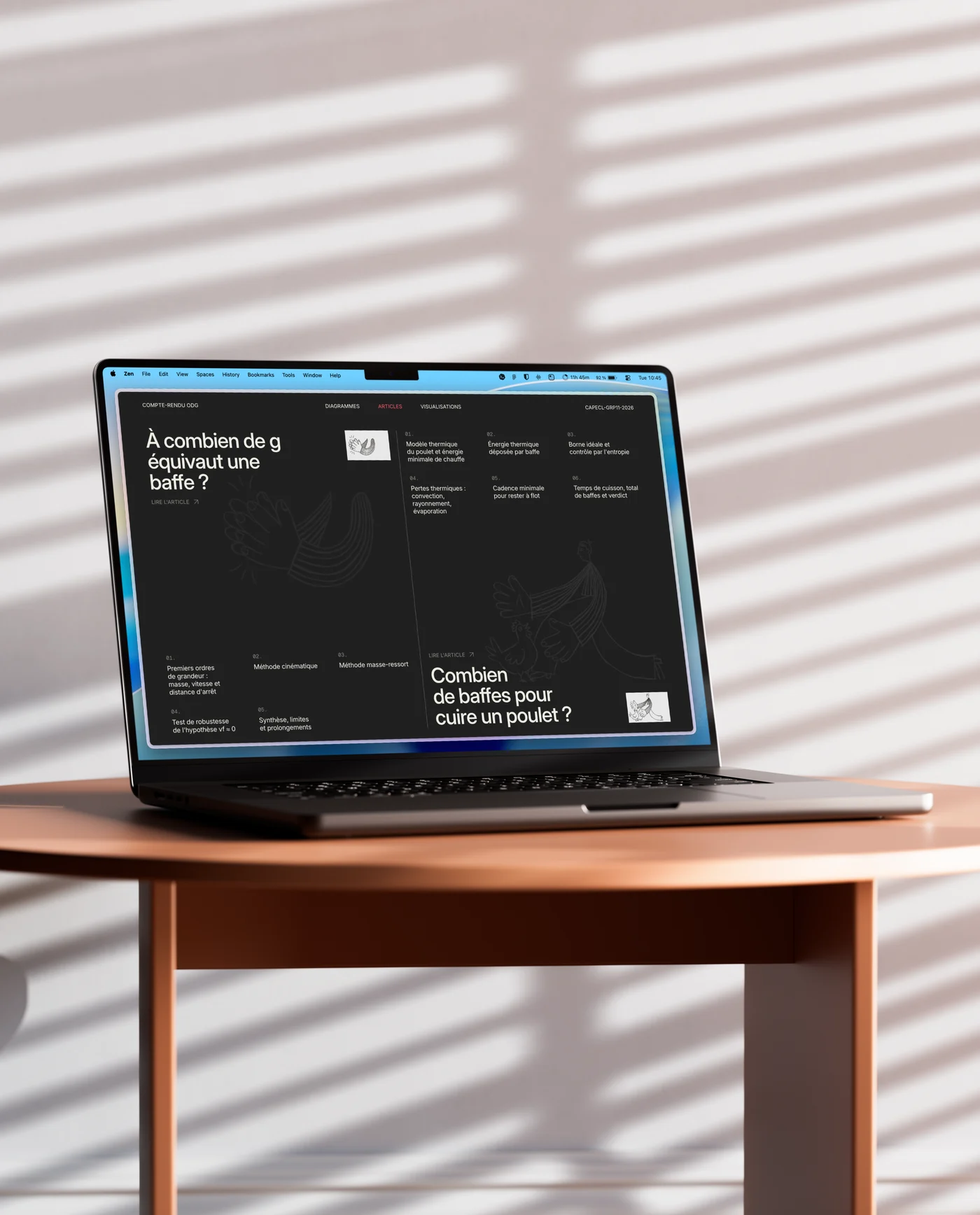 Laptop displaying an article and diagram interface.