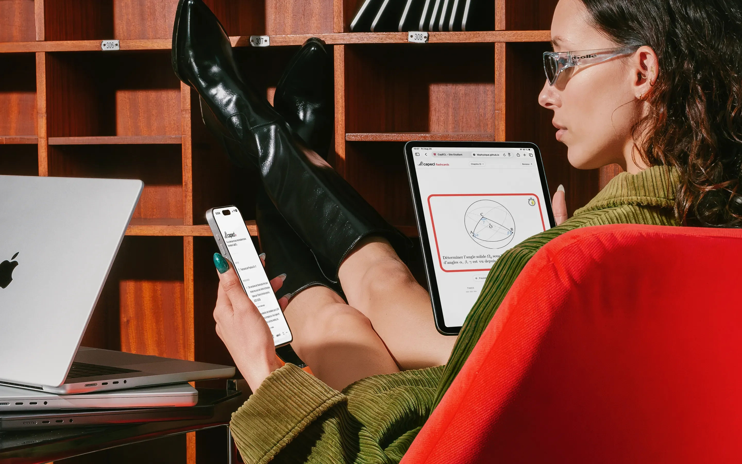 Woman using the CapECL website across an iPad and iPhone