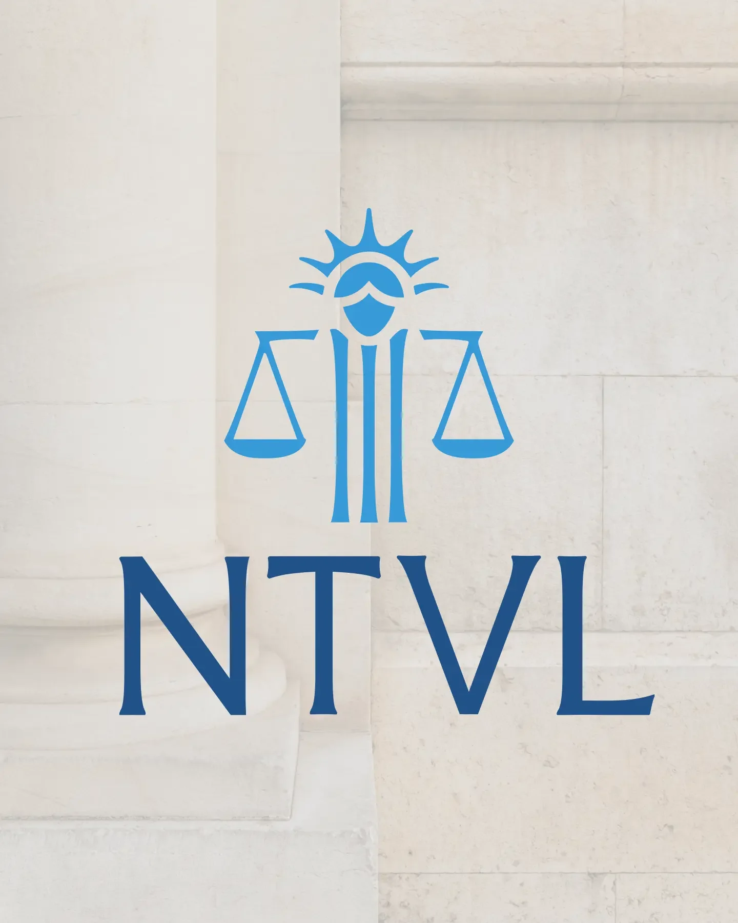Blue NTVL scales-of-justice symbol and wordmark on a pale stone wall.